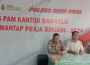 Personel OMP Rinjani 2024 Polres Bima Kota Laksanakan Pengamanan 24 Jam di Kantor KPU dan Bawaslu Kota Bima