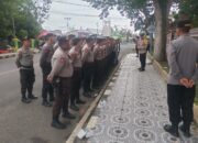 Pengamanan Ketat oleh Anggota Polres Dompu Pastikan Rapat Paripurna DPRD Berjalan Lancar